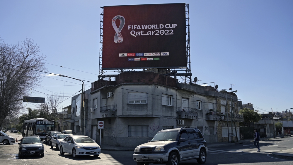 An elctronic board displays the official logo of the World Cup 2022 in Buenos Aires outskirts